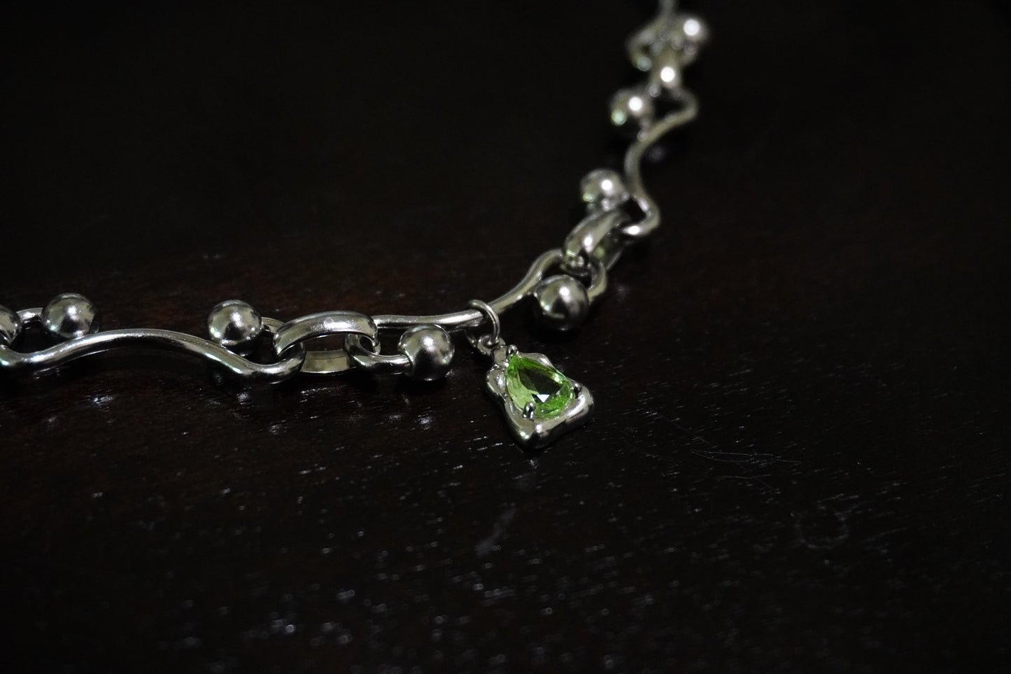 Green charm necklace