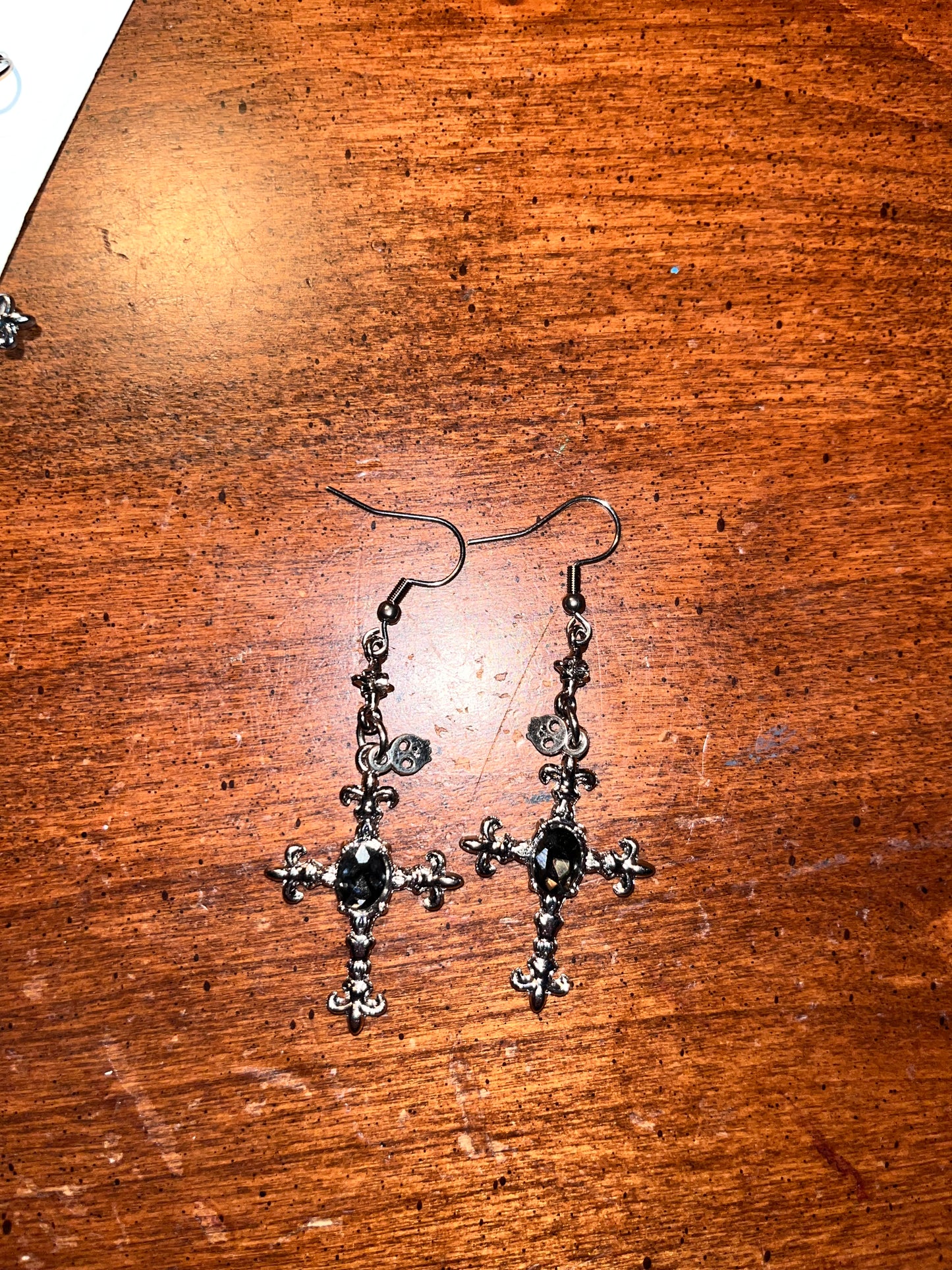 Black cross earrings